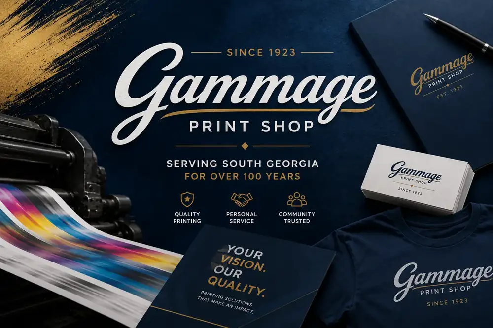 Gammage Print Shop branded stationery, business cards and envelopes on a navy desk